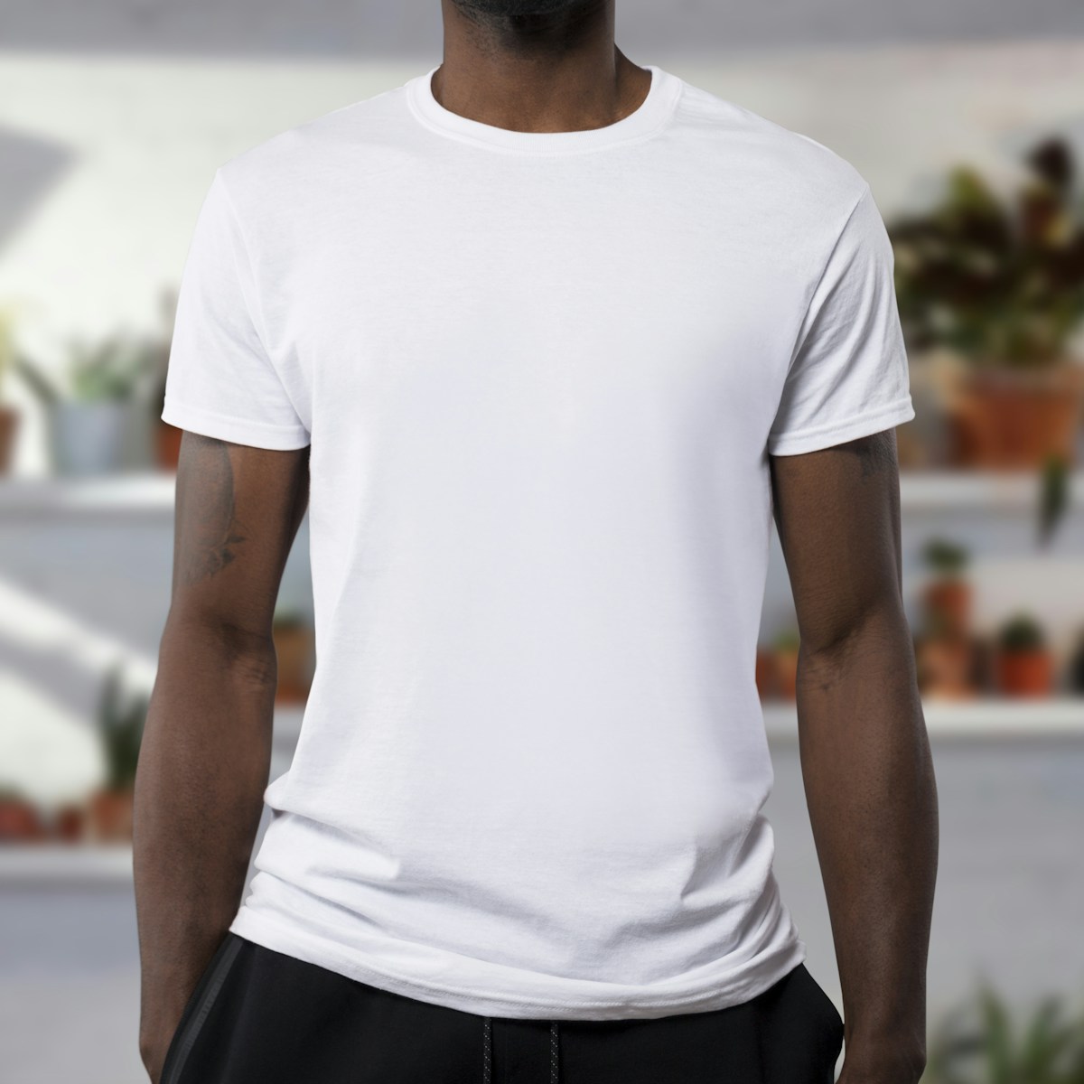 Simple white T-shirt as an example of a first clothing product