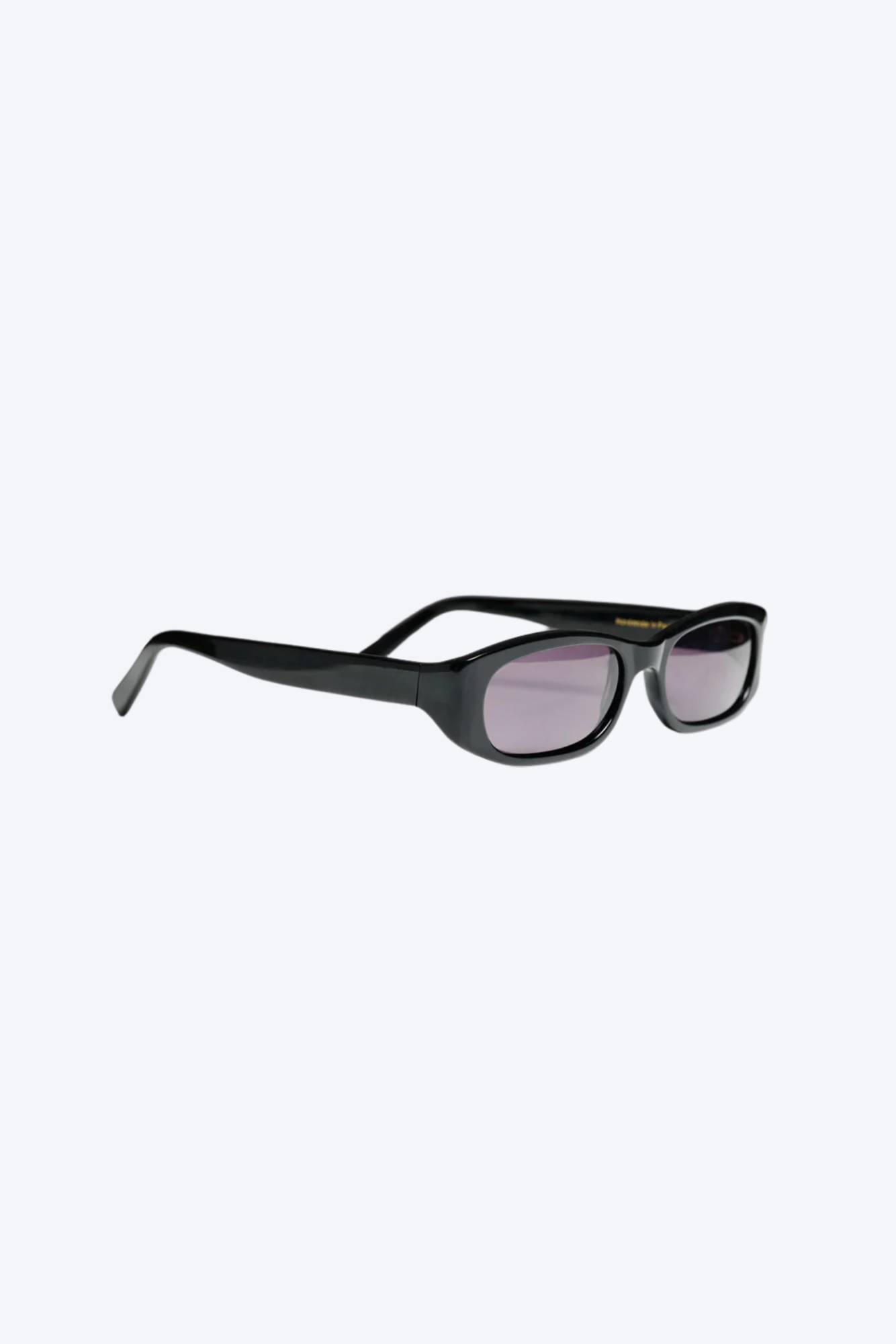 Black rectangular sunglasses with gray-tinted lenses and a sleek acetate frame.