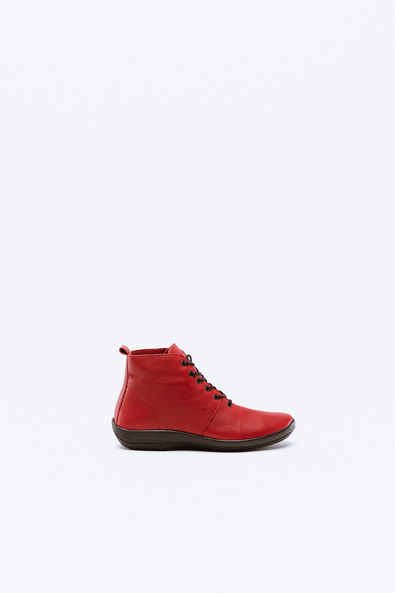 A red leather ankle boot with black laces and a comfortable rubber sole in dark brown.