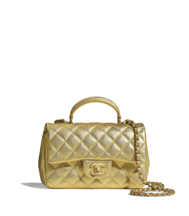 The Designer Bags Of 2021. Chanel Mini Flap Bag With Top Handle Gold