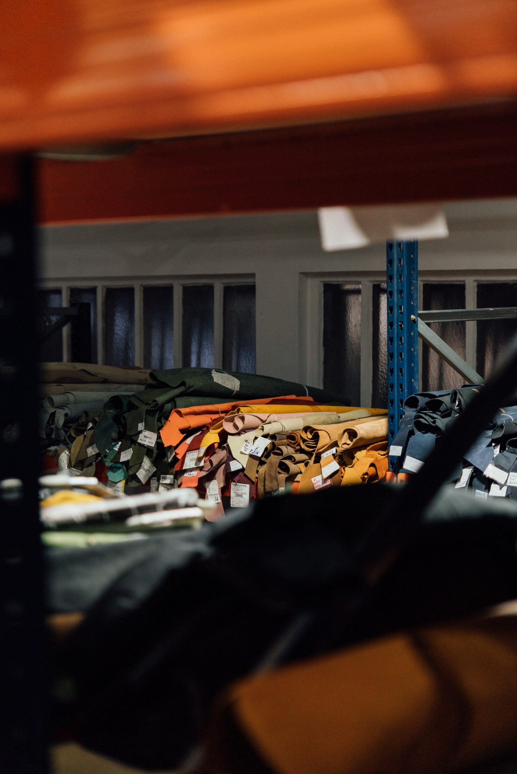 Leather sheets in warehouse for sourcing.